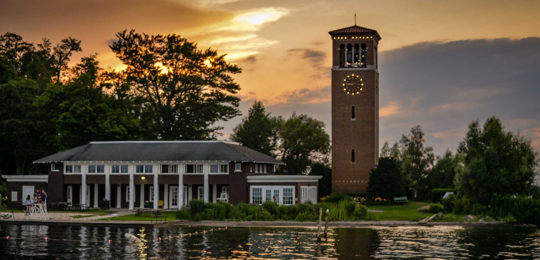 View of Chautauqua bell tower in the evening with lake in the foreground